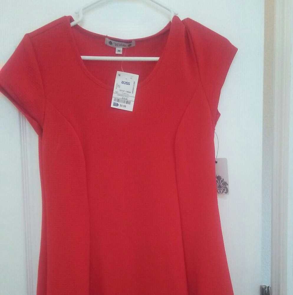 Red short sleeve peplum dress.